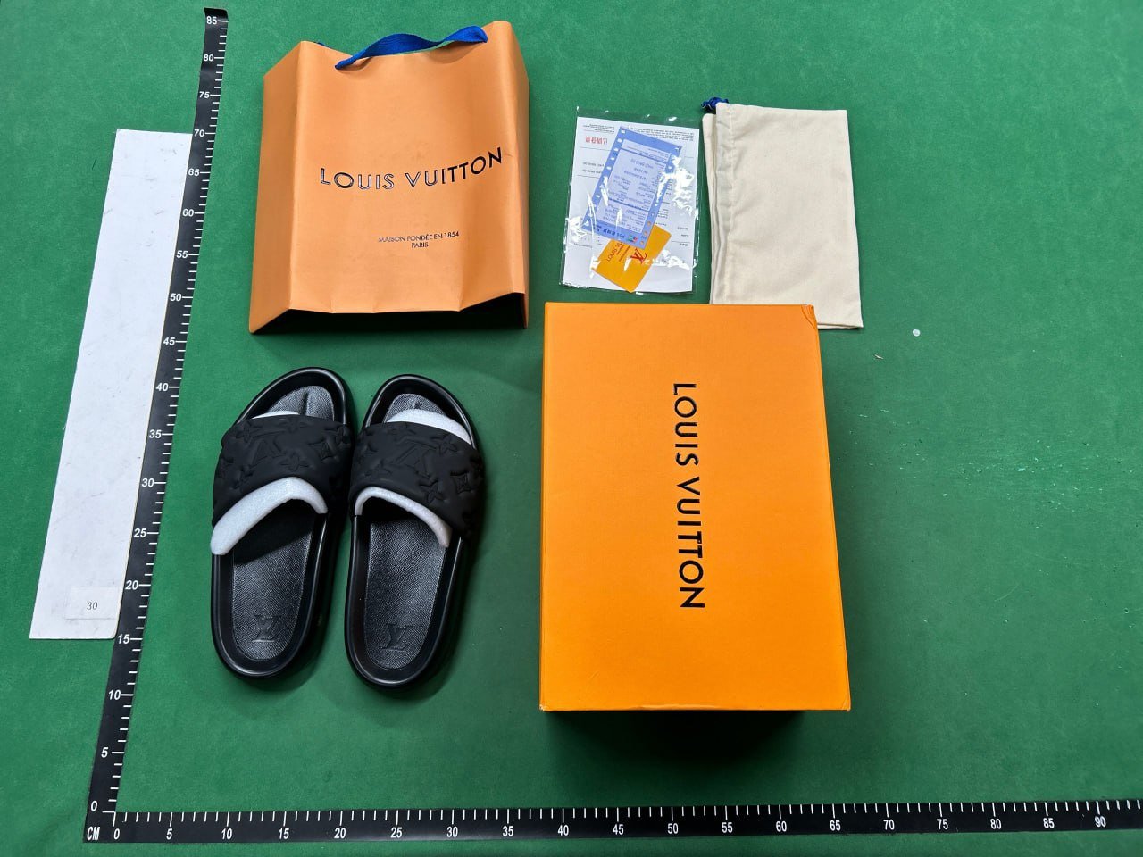 Louis Vuitton slippers                                                                                               
